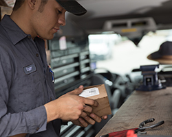 man working on Generator Supercenter service vehicles